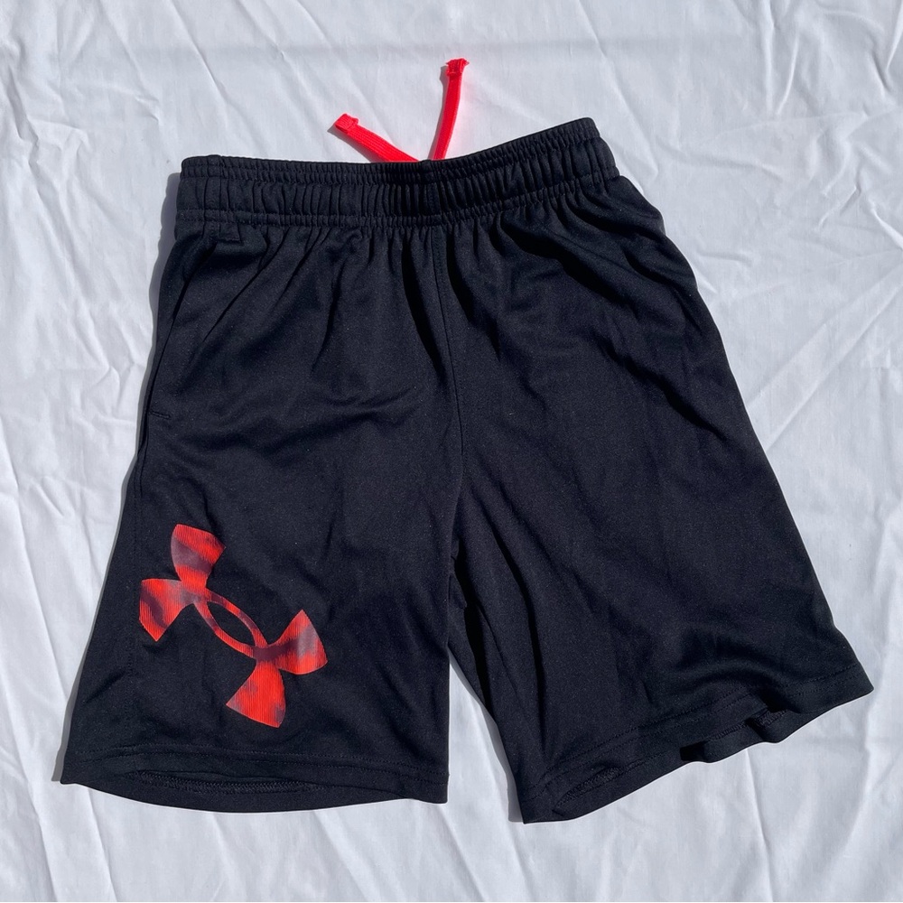 Under Armour Boys Athletic Shorts in Black with Orange/Red Logo, Size YSM